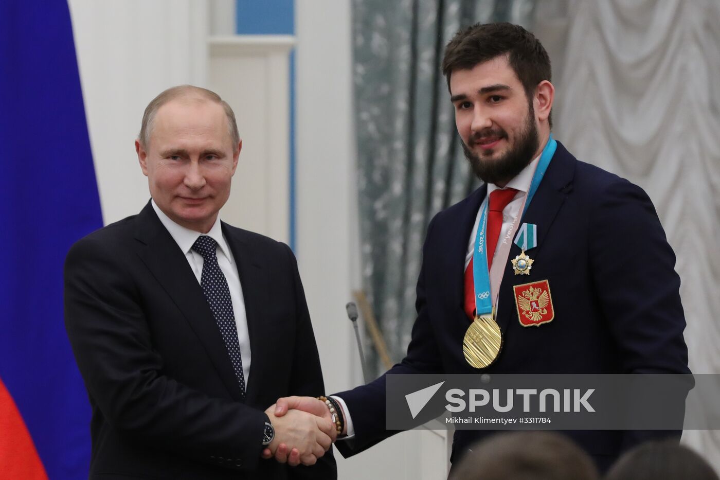 President Vladimir Putin presents state decorations to 2018 Winter Olympics medalists