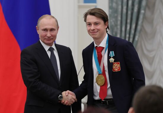 President Vladimir Putin presents state decorations to 2018 Winter Olympics medalists