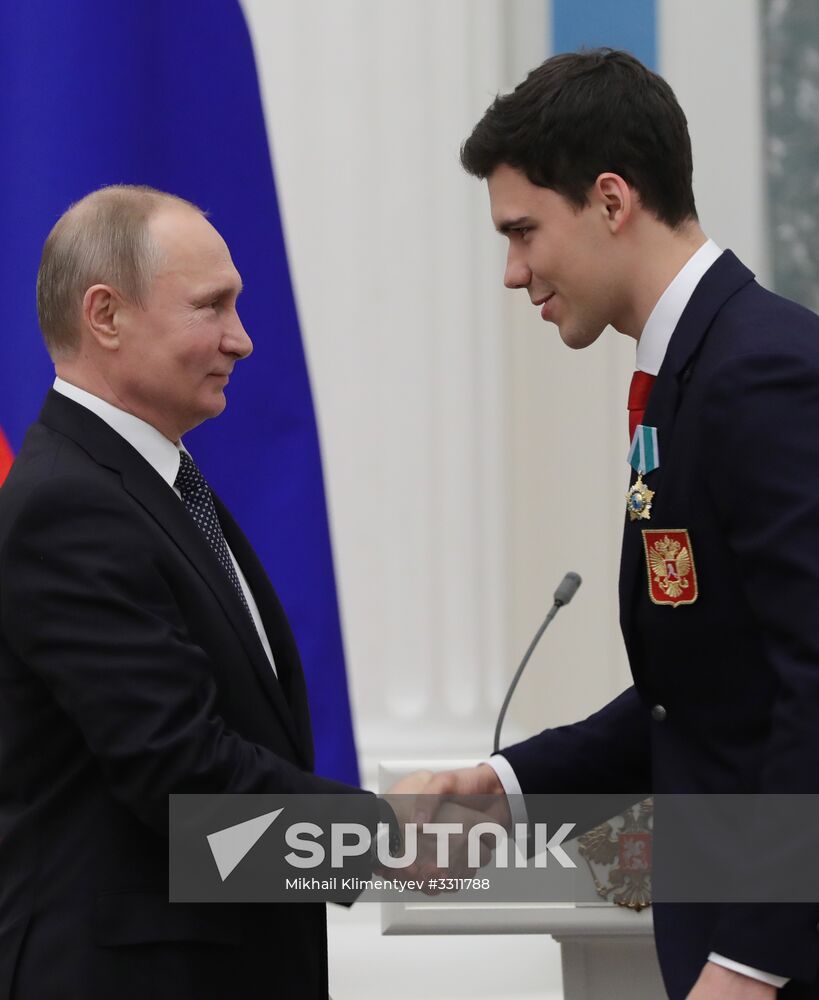 President Vladimir Putin presents state decorations to 2018 Winter Olympics medalists