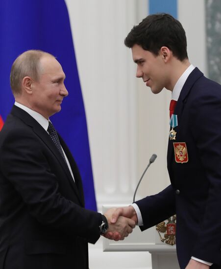President Vladimir Putin presents state decorations to 2018 Winter Olympics medalists