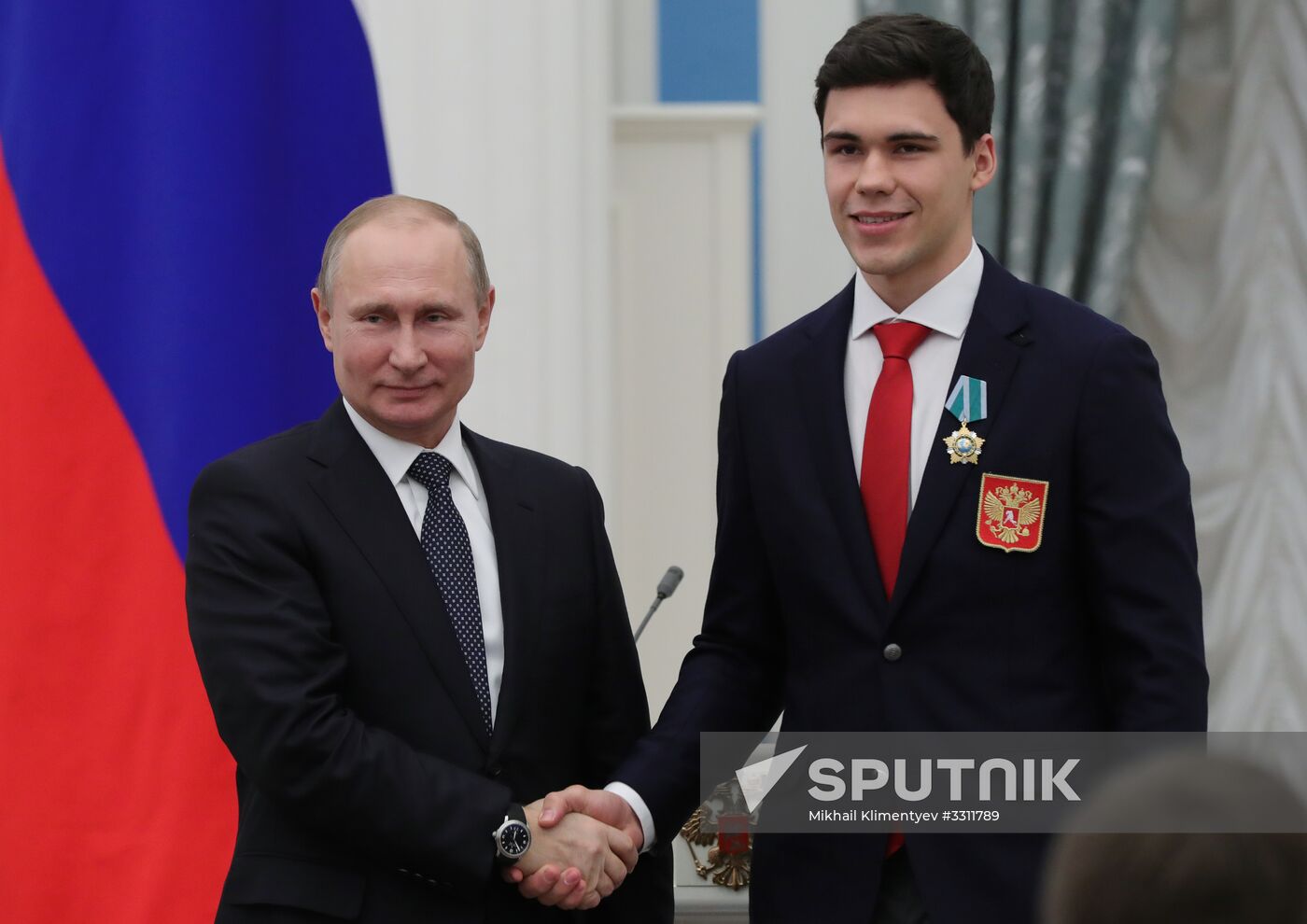 President Vladimir Putin presents state decorations to 2018 Winter Olympics medalists