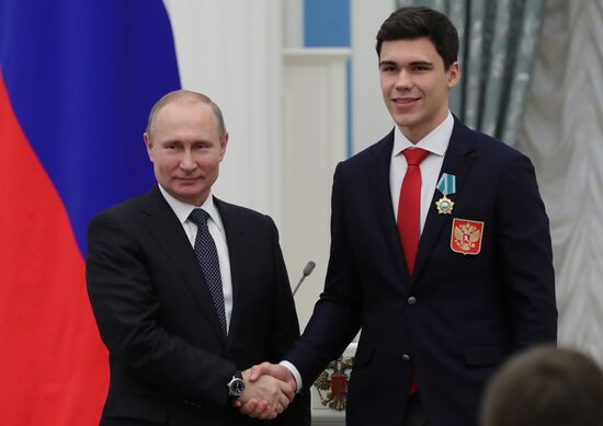 President Vladimir Putin presents state decorations to 2018 Winter Olympics medalists