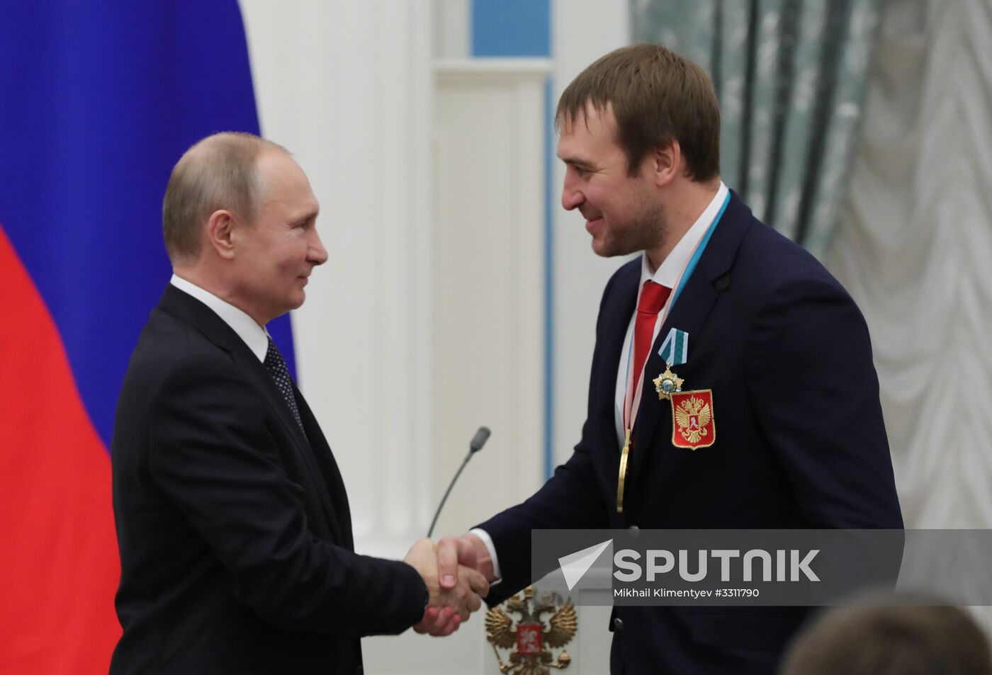 President Vladimir Putin presents state decorations to 2018 Winter Olympics medalists