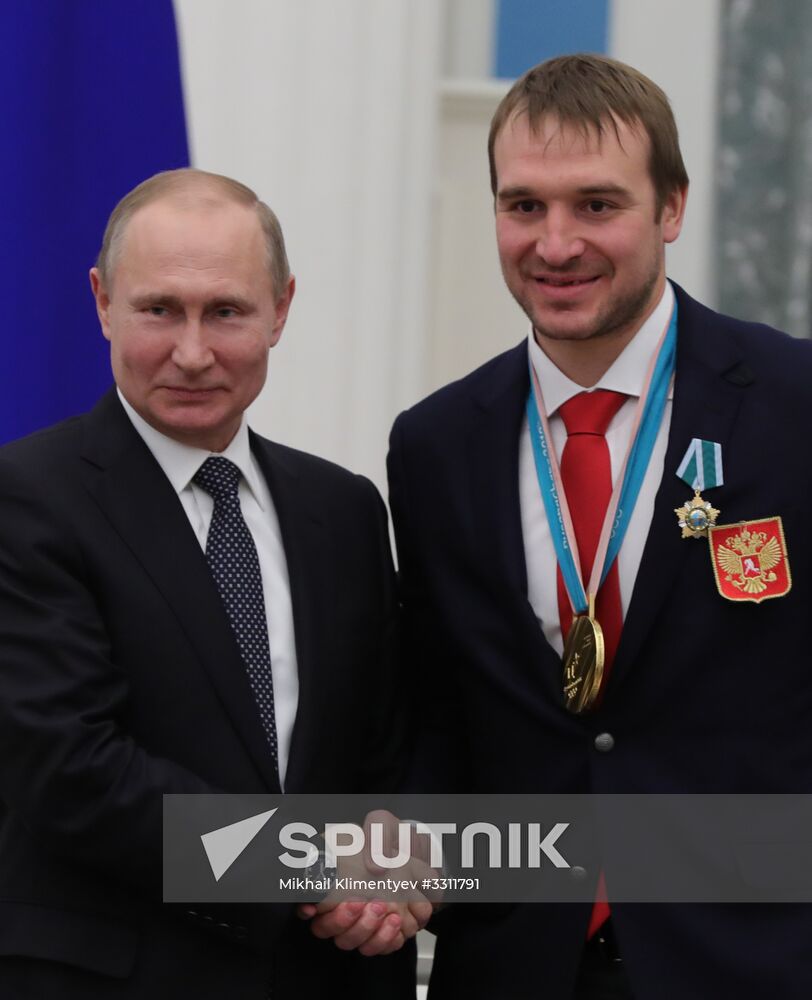 President Vladimir Putin presents state decorations to 2018 Winter Olympics medalists