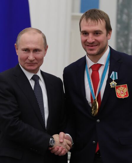 President Vladimir Putin presents state decorations to 2018 Winter Olympics medalists