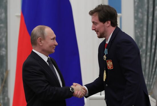 President Vladimir Putin presents state decorations to 2018 Winter Olympics medalists