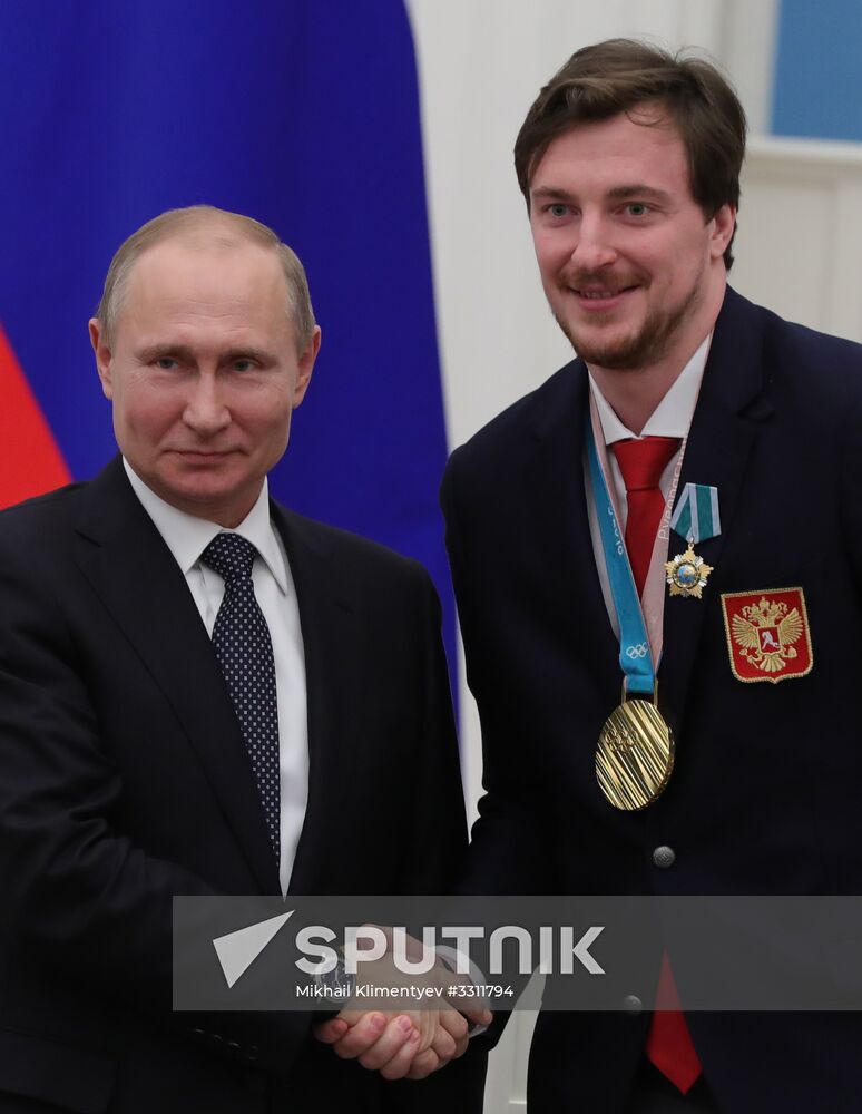 President Vladimir Putin presents state decorations to 2018 Winter Olympics medalists