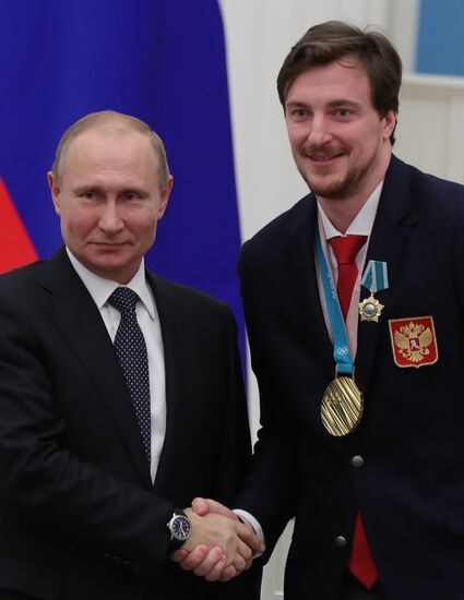 President Vladimir Putin presents state decorations to 2018 Winter Olympics medalists