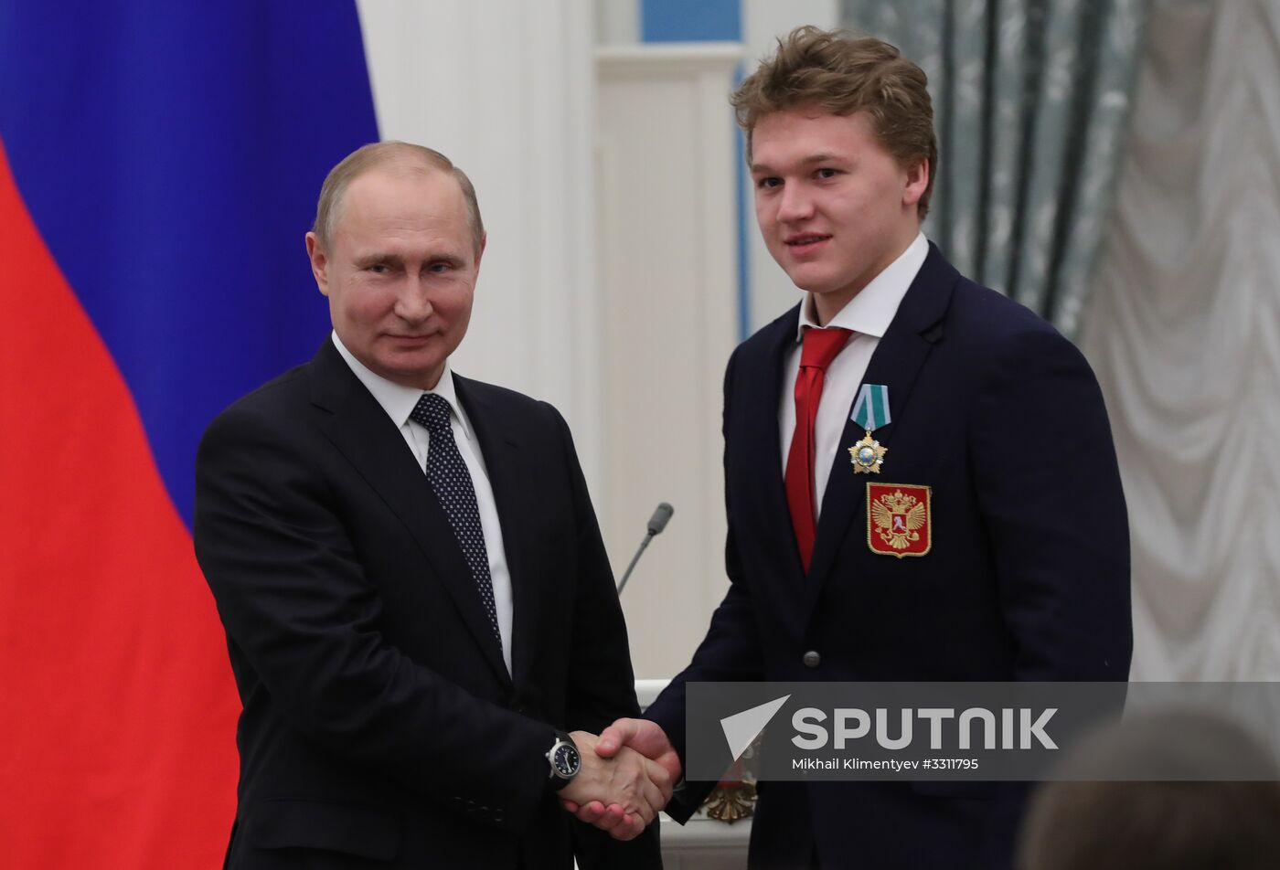President Vladimir Putin presents state decorations to 2018 Winter Olympics medalists