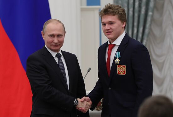 President Vladimir Putin presents state decorations to 2018 Winter Olympics medalists