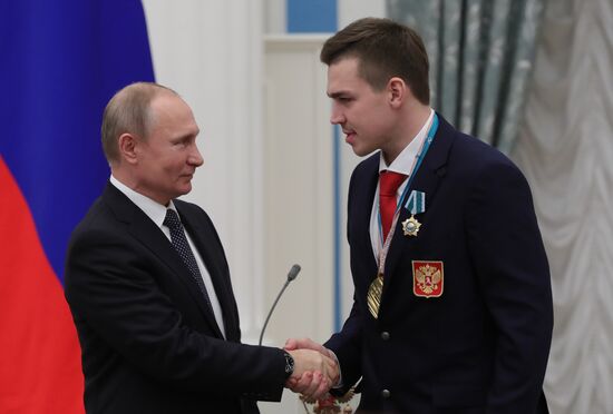 President Vladimir Putin presents state decorations to 2018 Winter Olympics medalists