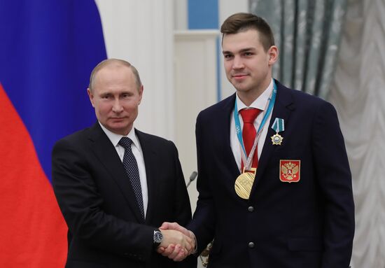 President Vladimir Putin presents state decorations to 2018 Winter Olympics medalists