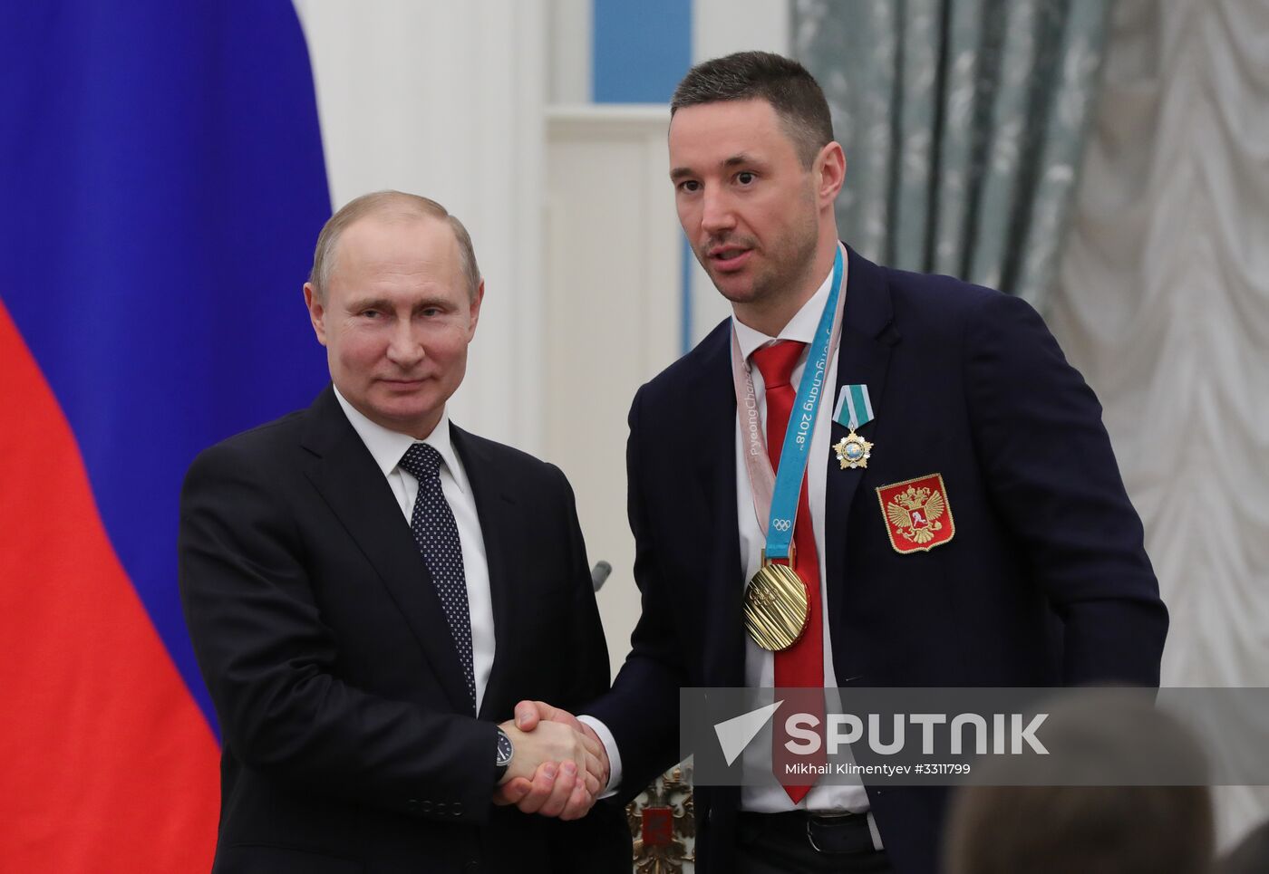 President Vladimir Putin presents state decorations to 2018 Winter Olympics medalists