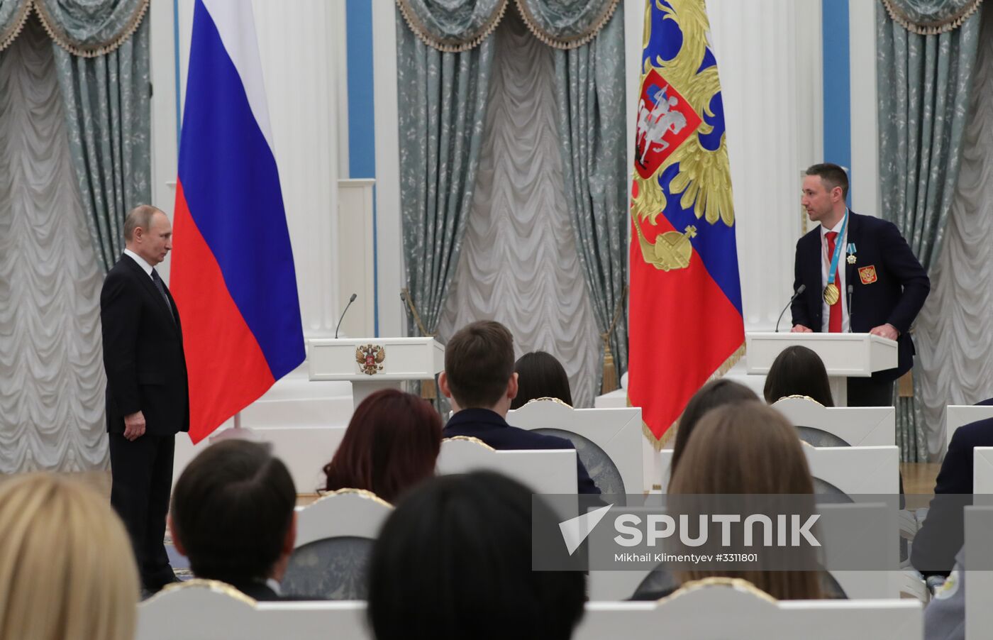 President Vladimir Putin presents state decorations to 2018 Winter Olympics medalists