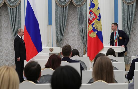 President Vladimir Putin presents state decorations to 2018 Winter Olympics medalists