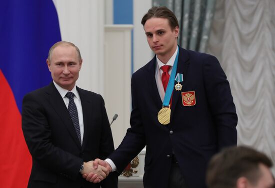 President Vladimir Putin presents state decorations to 2018 Winter Olympics medalists