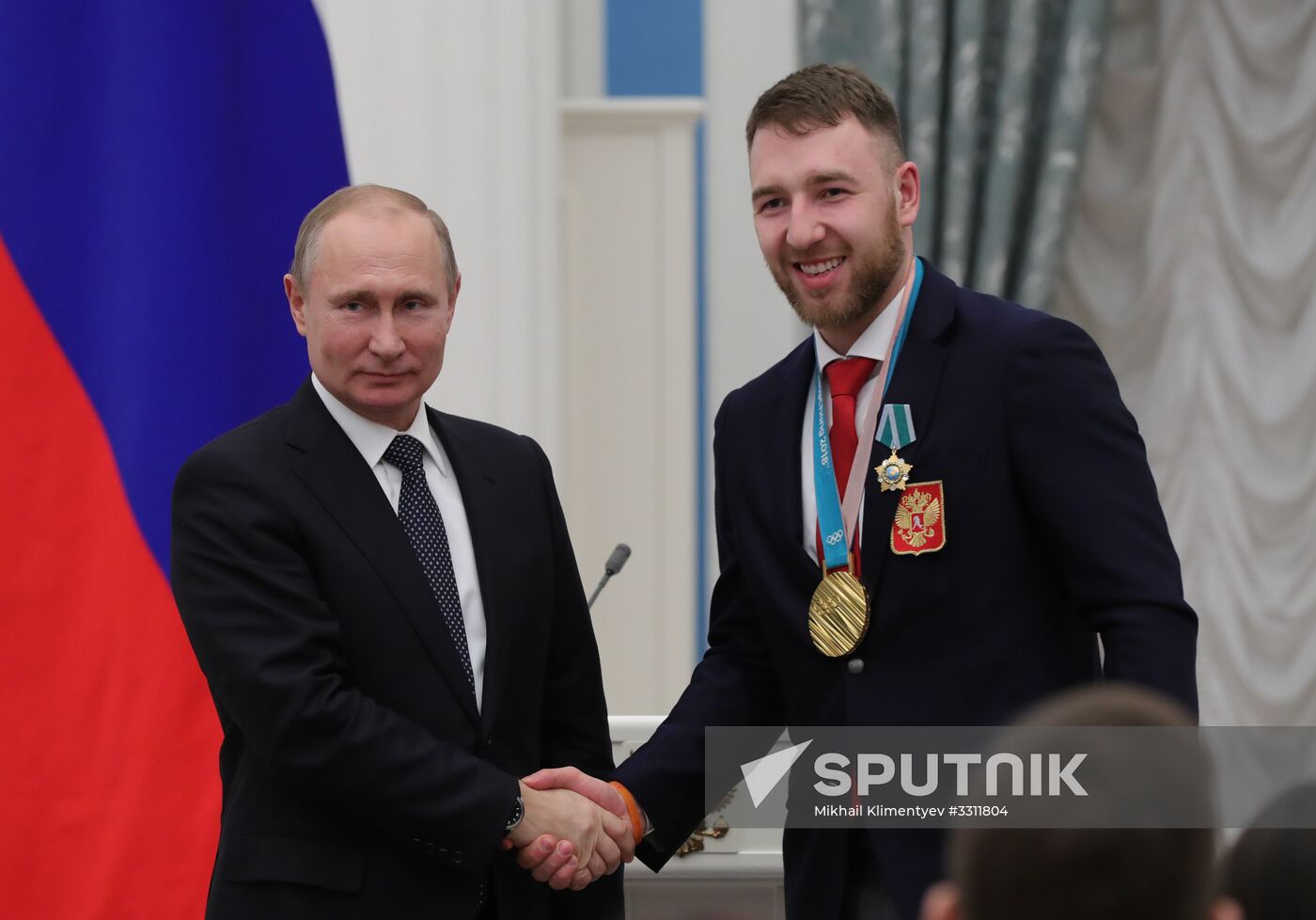 President Vladimir Putin presents state decorations to 2018 Winter Olympics medalists