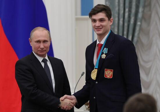 President Vladimir Putin presents state decorations to 2018 Winter Olympics medalists