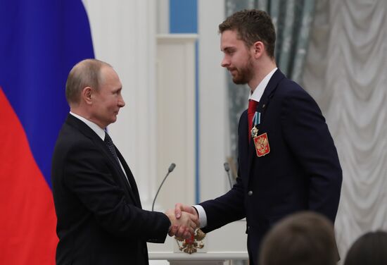President Vladimir Putin presents state decorations to 2018 Winter Olympics medalists