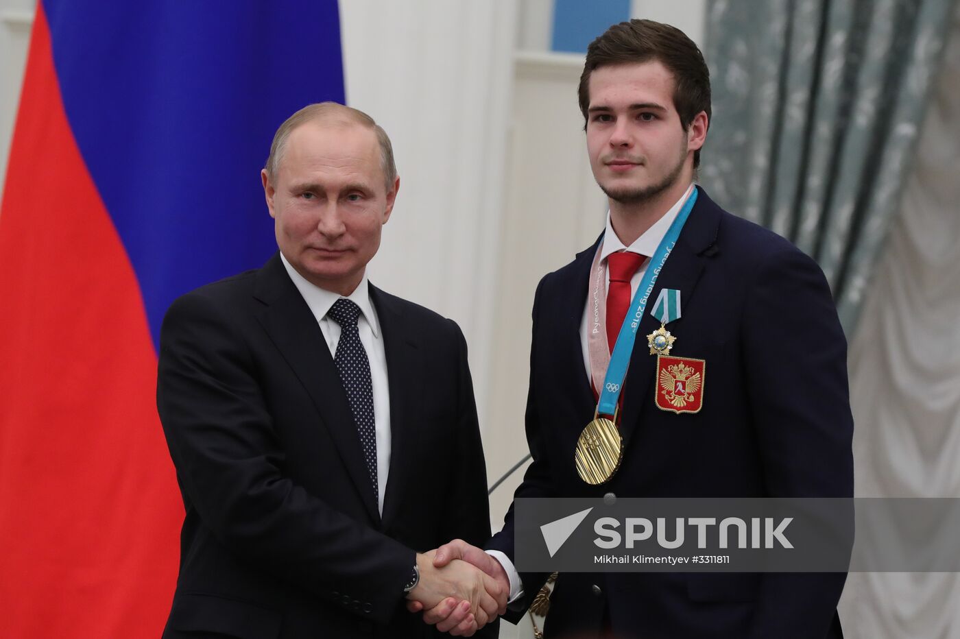 President Vladimir Putin presents state decorations to 2018 Winter Olympics medalists