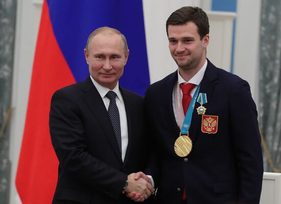 President Vladimir Putin presents state decorations to 2018 Winter Olympics medalists