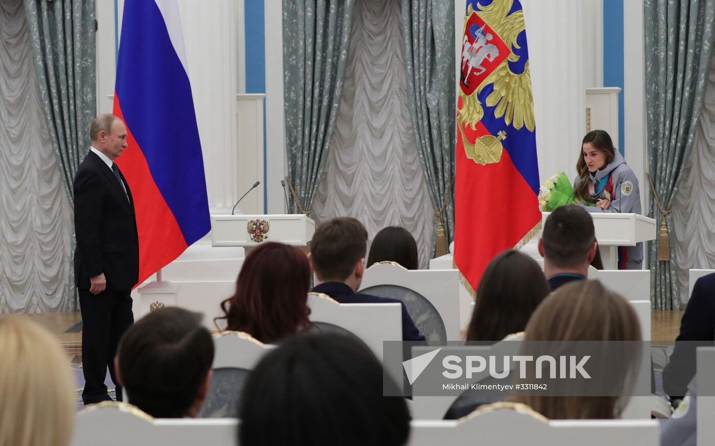 President Vladimir Putin presents state decorations to 2018 Winter Olympics medalists