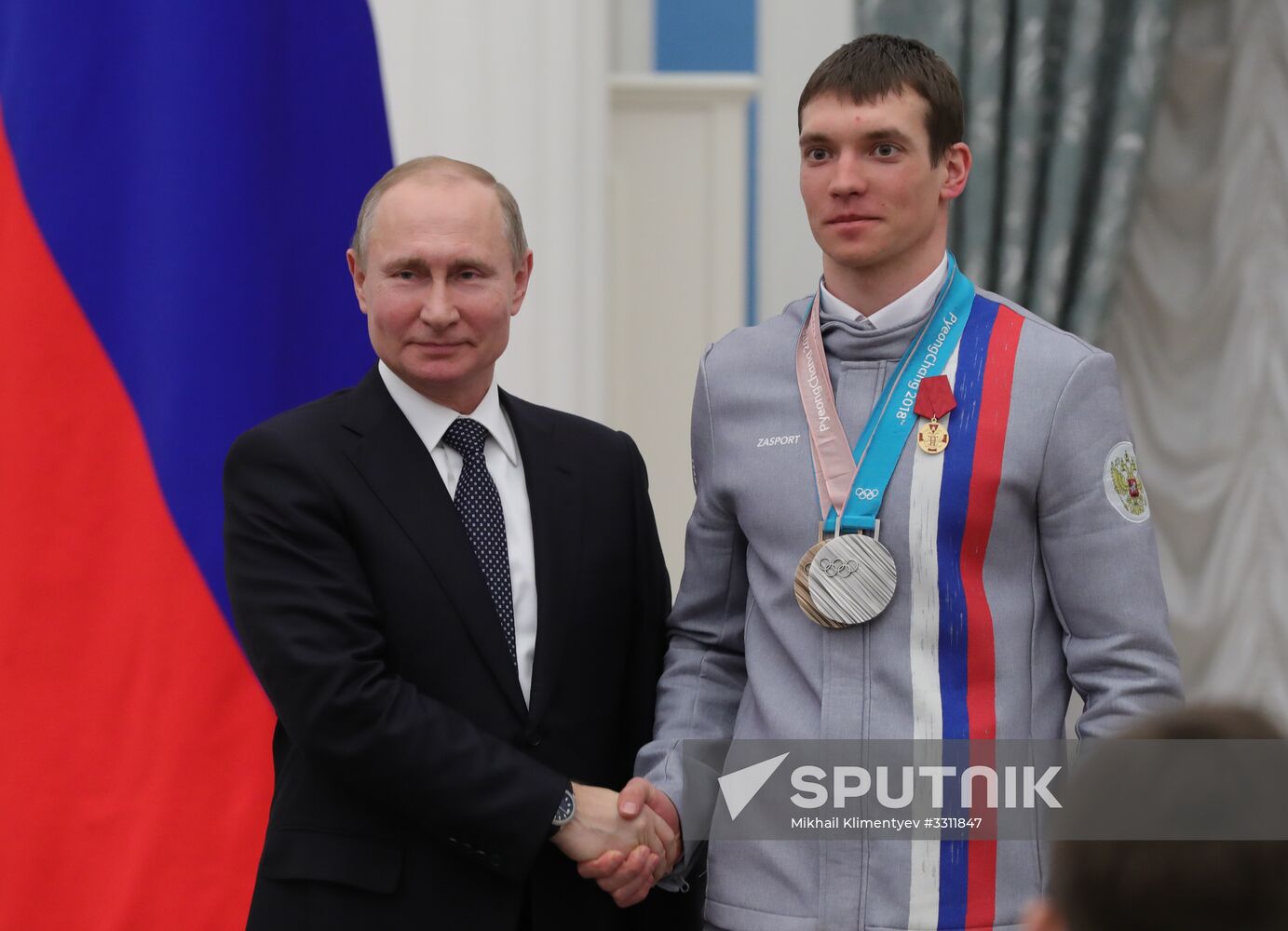 President Vladimir Putin presents state decorations to 2018 Winter Olympics medalists