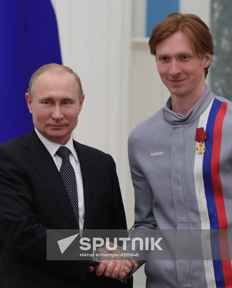 President Vladimir Putin presents state decorations to 2018 Winter Olympics medalists