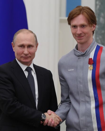 President Vladimir Putin presents state decorations to 2018 Winter Olympics medalists