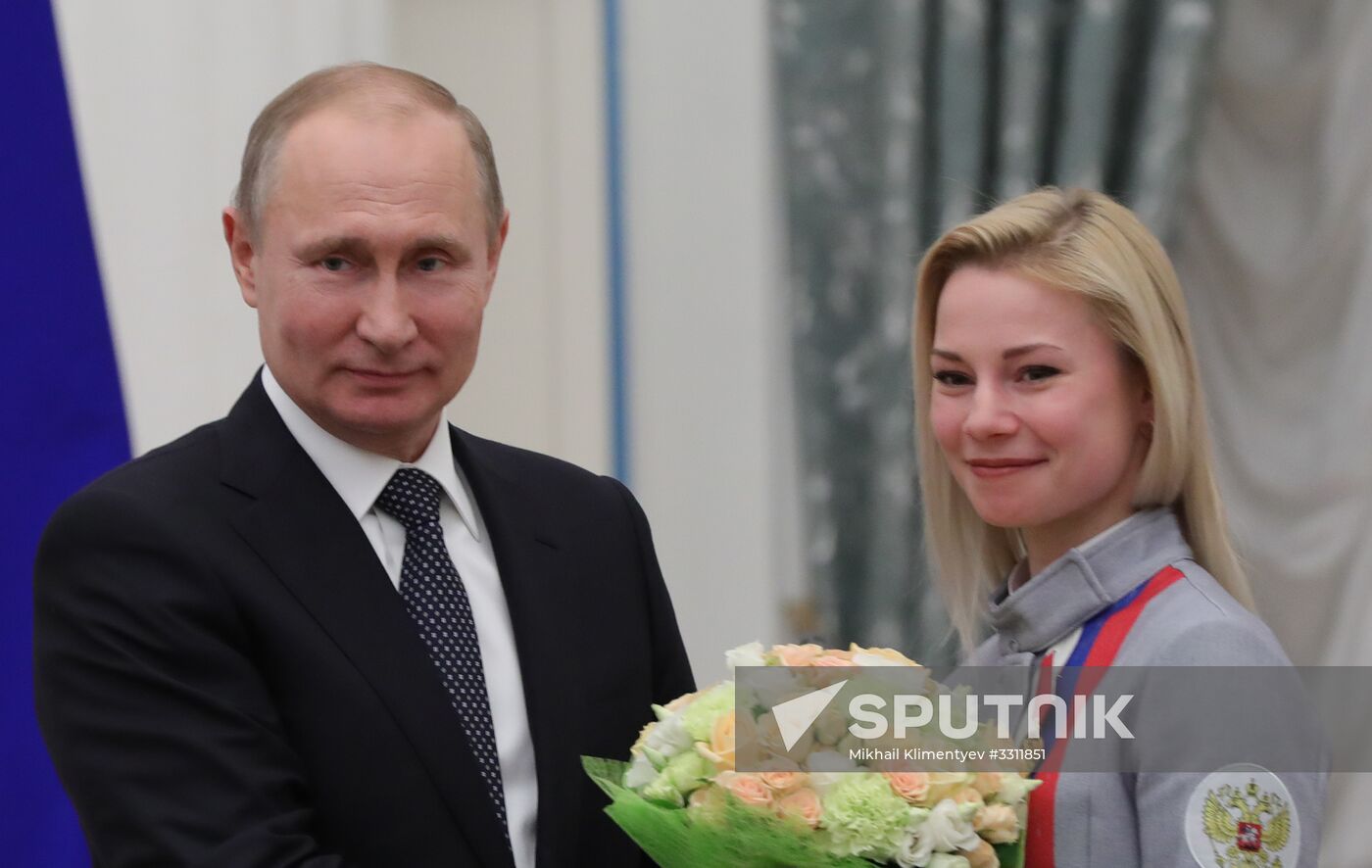 President Vladimir Putin presents state decorations to 2018 Winter Olympics medalists