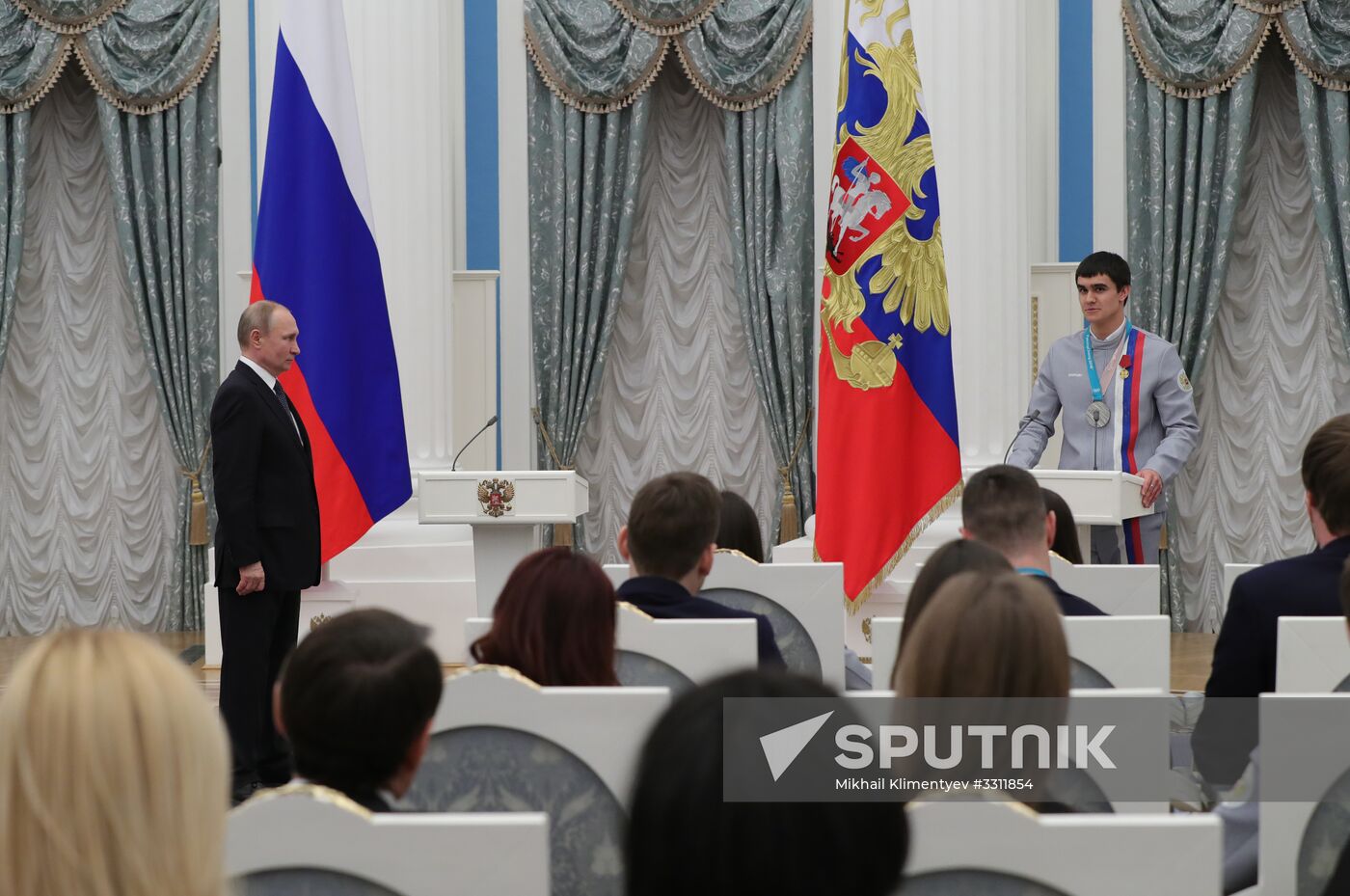 President Vladimir Putin presents state decorations to 2018 Winter Olympics medalists