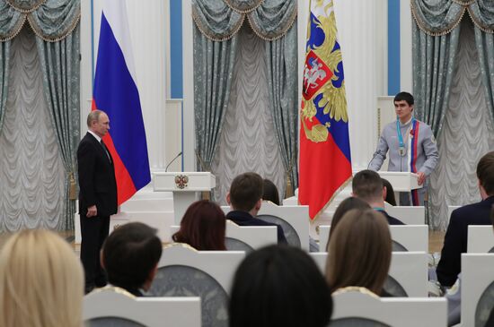 President Vladimir Putin presents state decorations to 2018 Winter Olympics medalists