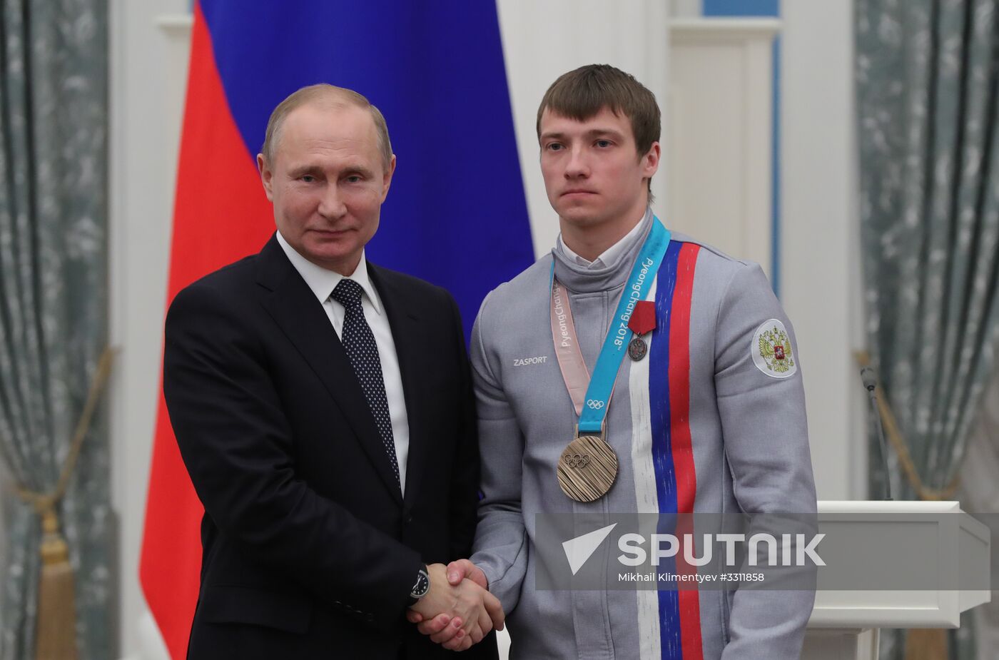 President Vladimir Putin presents state decorations to 2018 Winter Olympics medalists