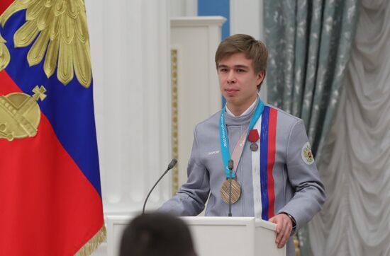 President Vladimir Putin presents state decorations to 2018 Winter Olympics medalists