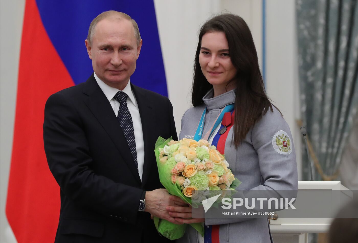 President Vladimir Putin presents state decorations to 2018 Winter Olympics medalists