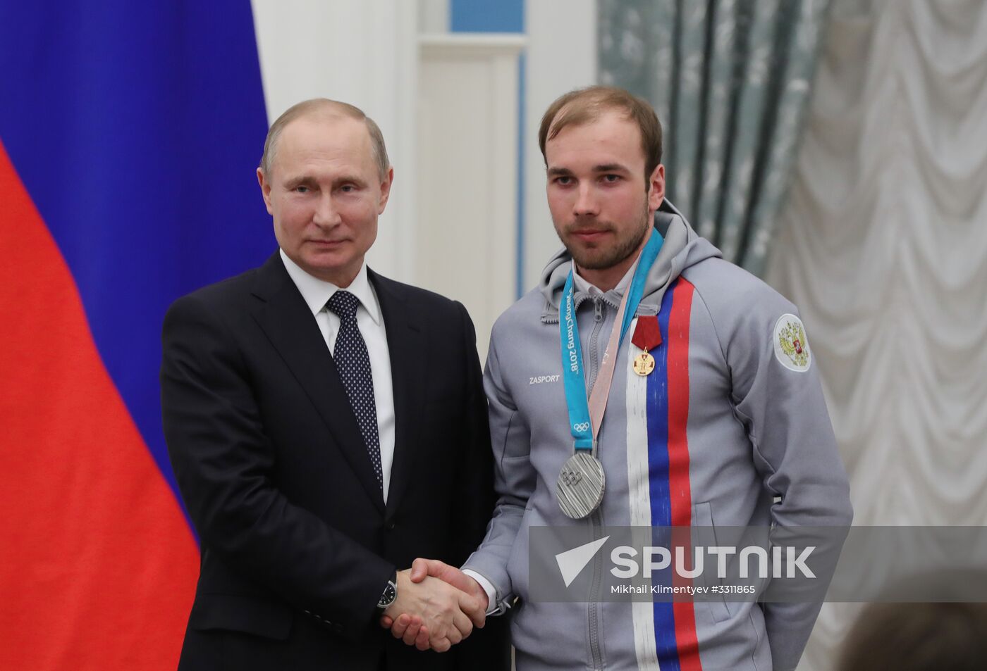President Vladimir Putin presents state decorations to 2018 Winter Olympics medalists