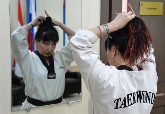Nontraditional occupations for women. Yelena Aseyeva, Master of Sport in Taekwondo