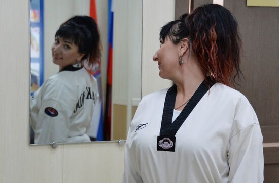 Nontraditional occupations for women. Yelena Aseyeva, Master of Sport in Taekwondo