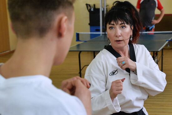 Nontraditional occupations for women. Yelena Aseyeva, Master of Sport in Taekwondo