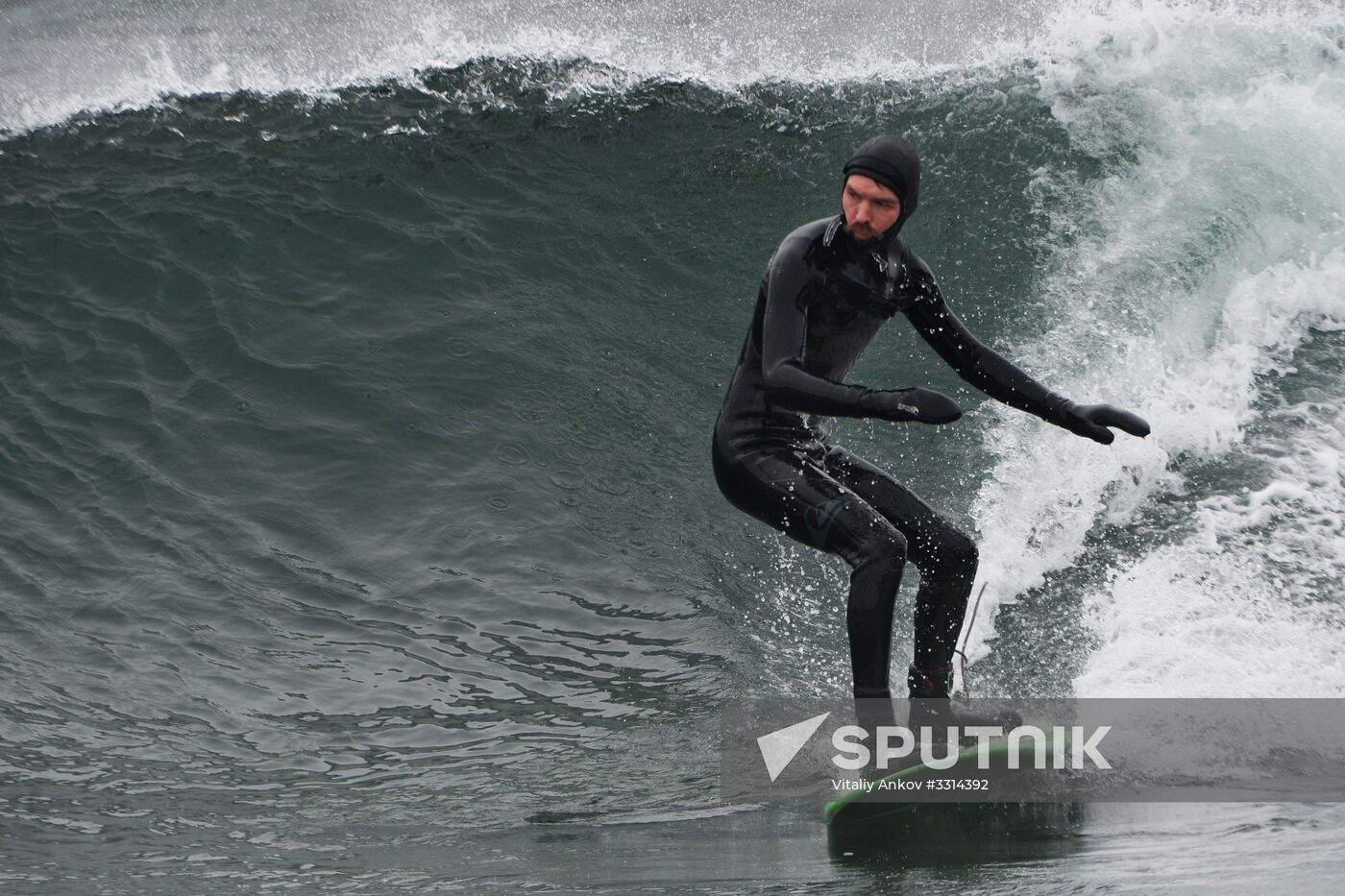 Winter surfing in Chernyshev Bay off Russky Island