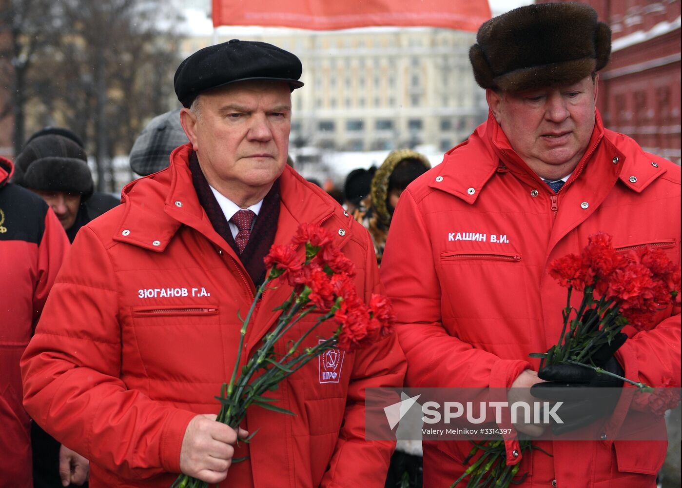 Laying flowers at Stalin's tomb by Kremlin wall