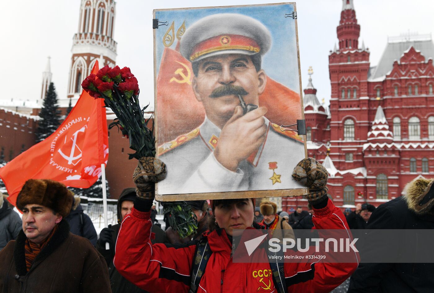 Laying flowers at Stalin's tomb by Kremlin wall