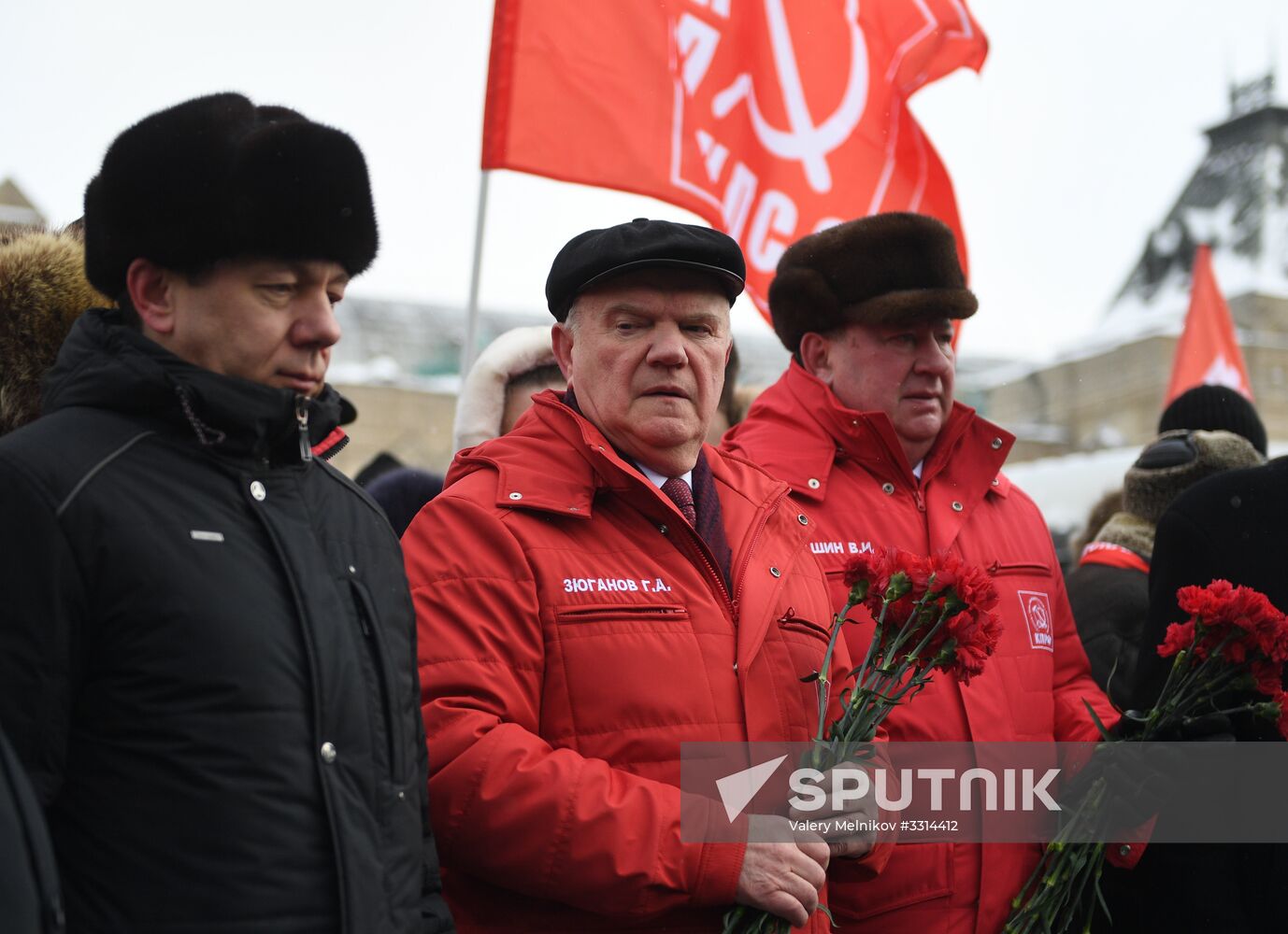 Laying flowers at Stalin's tomb by Kremlin wall