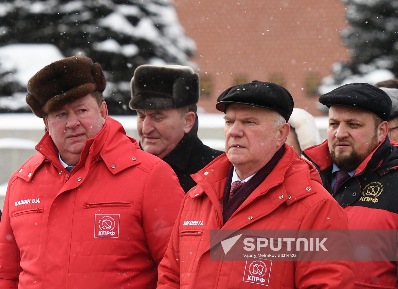 Laying flowers at Stalin's tomb by Kremlin wall