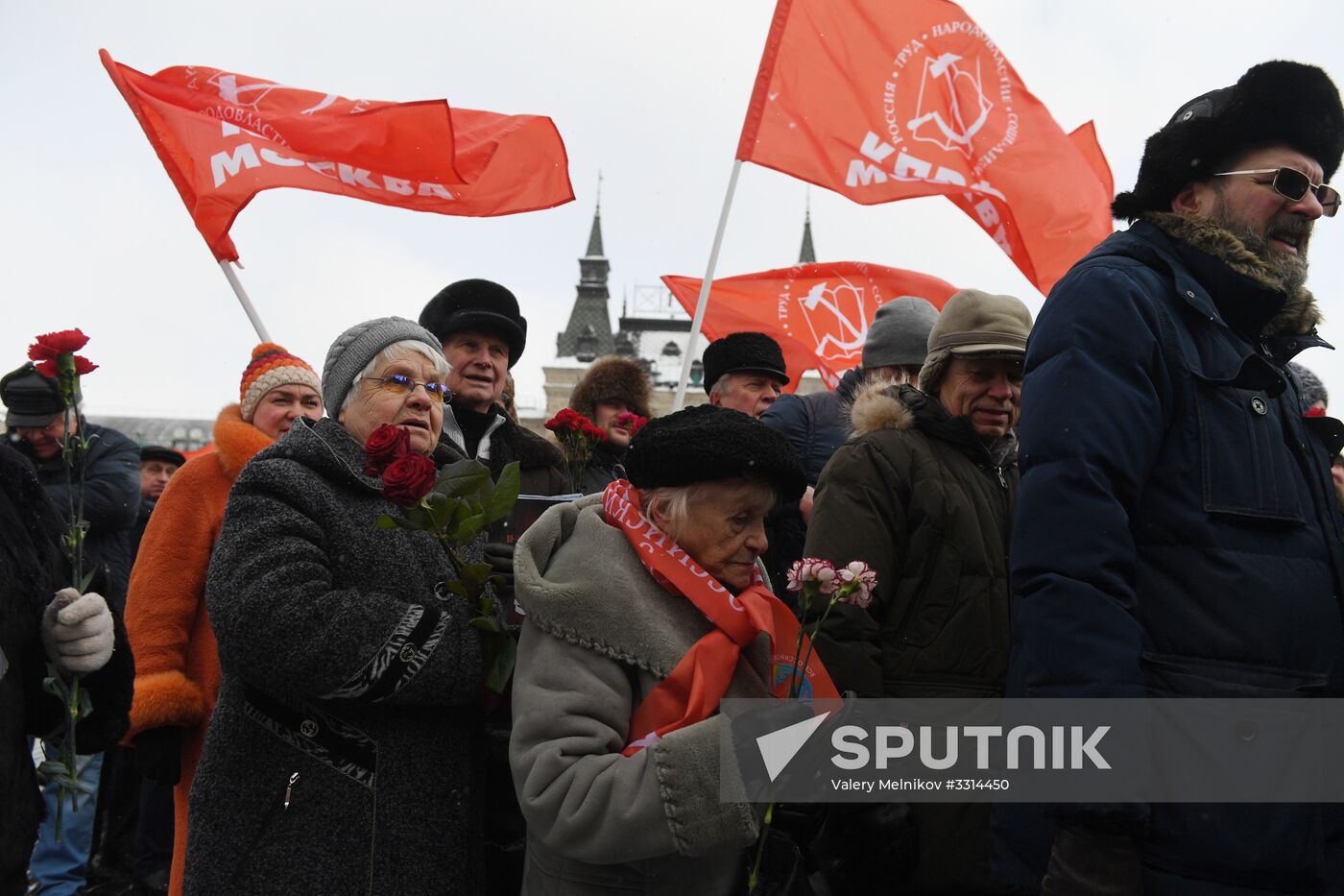 Laying flowers at Stalin's tomb by Kremlin wall