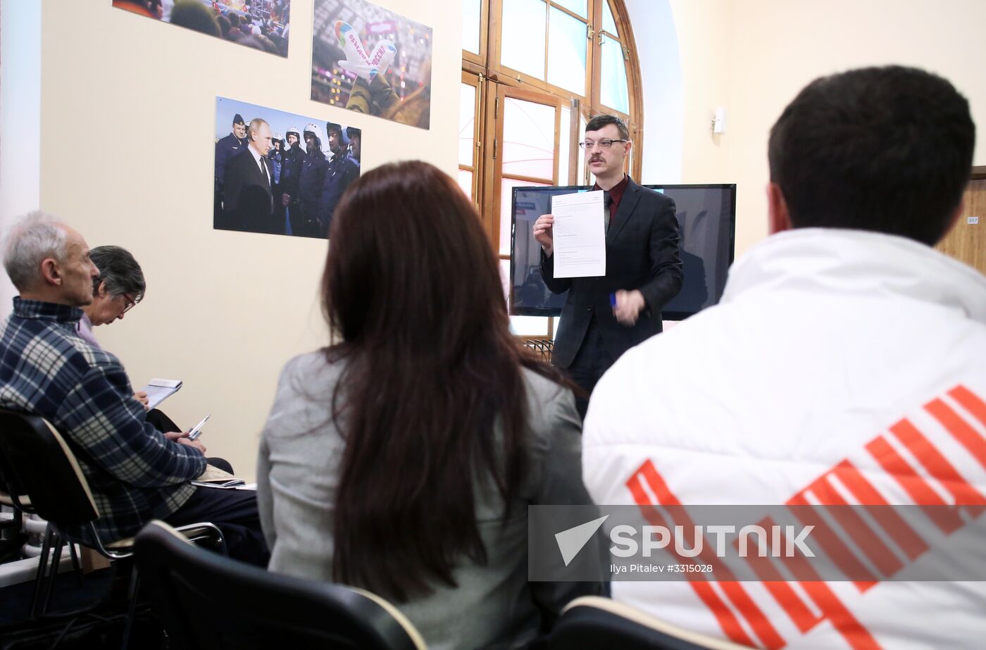 Coaching election monitors at Vladimir Putin's campaign headquarters