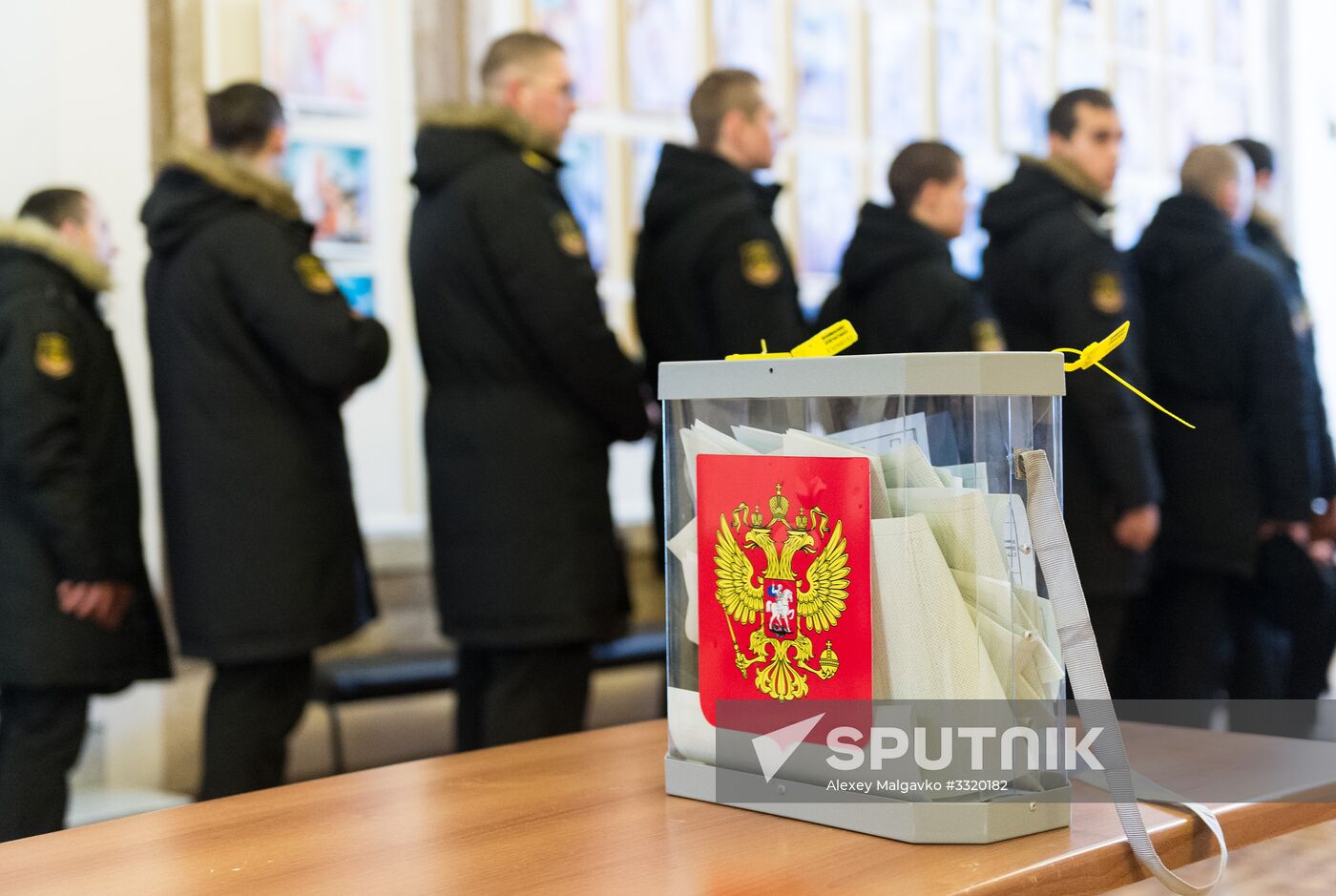 Military personnel during early voting for Russian president in Sevastopol