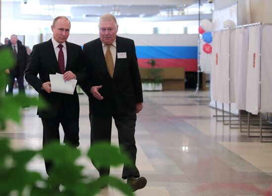 Vladimir Putin votes at Russian presidential elections