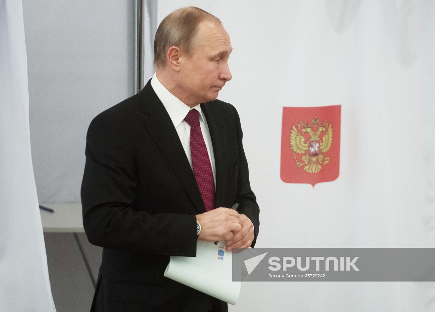 Vladimir Putin votes at Russian presidential elections