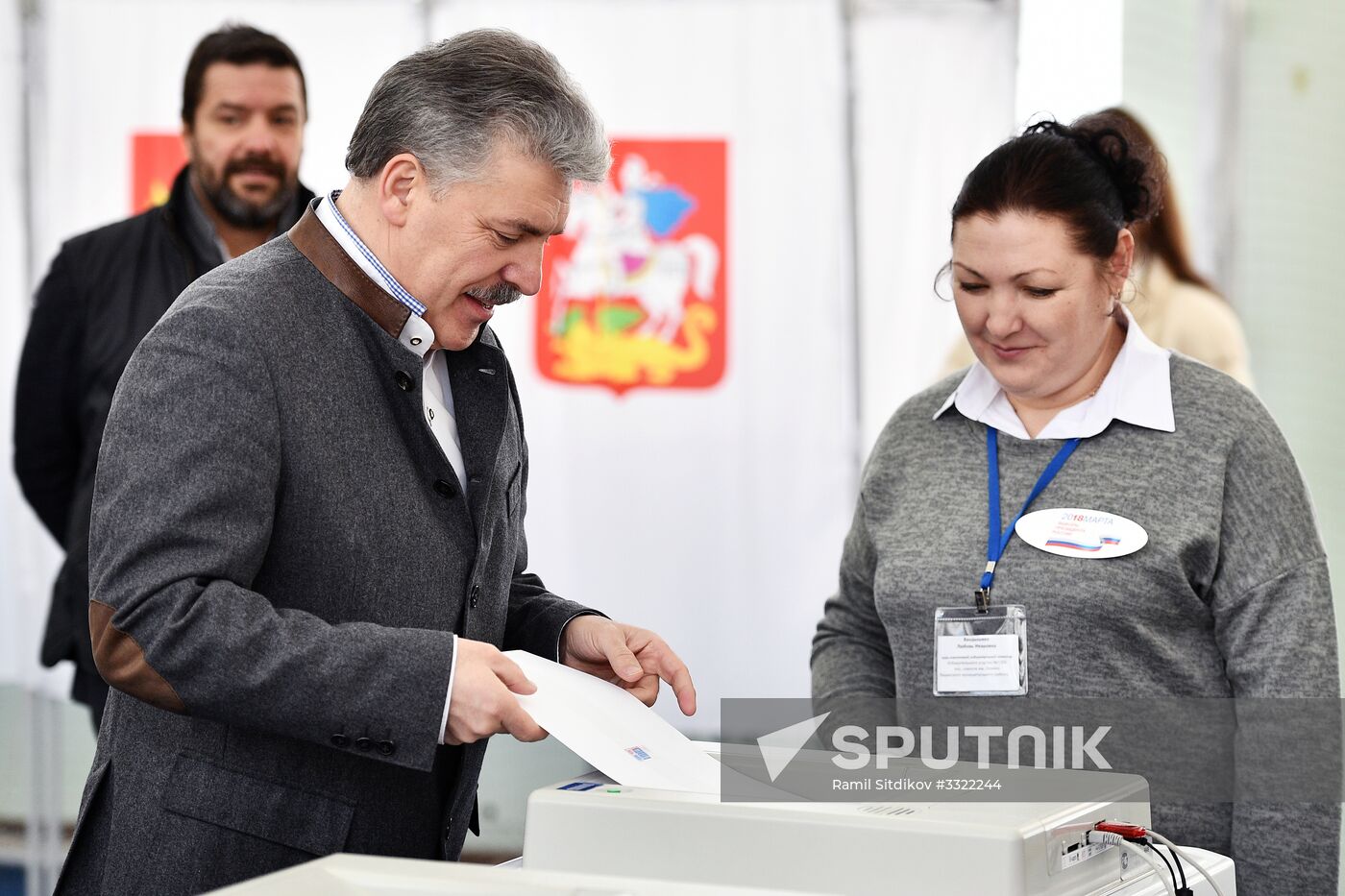 Russian presidential candidates cast their votes